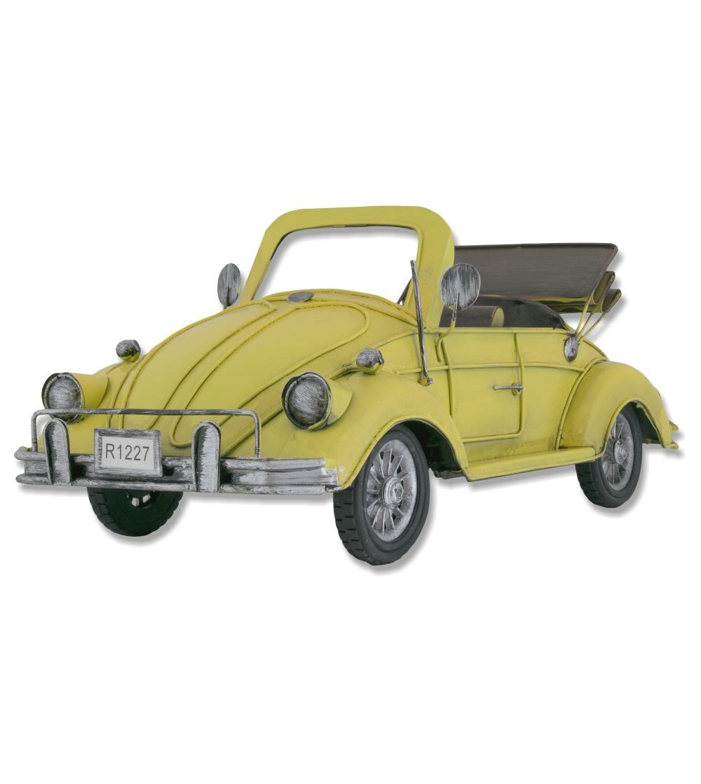 Volkswagen Beetle amarillo en metal