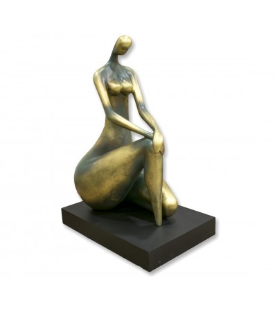 Seated woman sculpture